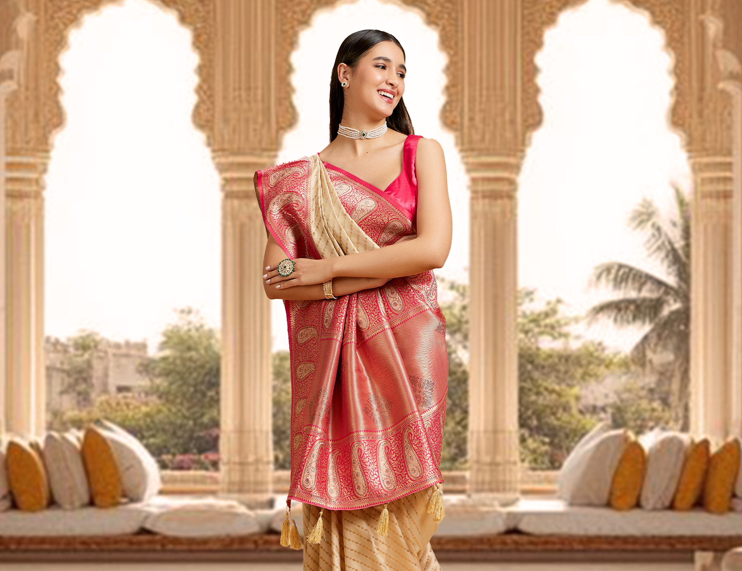 A women wearing red and gold saree with half sleeves blouse